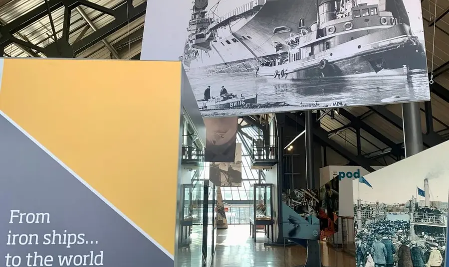dock-museum-shipbuilding-gallery-web.jpg Banners and historic photographs inside the Shipbuilders Gallery.